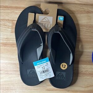 Reef Black Flip Flops with Bottle Opener